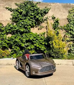 Aston Martin Champagne - ელექტრო მანქანა ტყავის სავარძლით